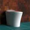 Swan S Pro smart toilet in a stylish bathroom with wood accent wall and teal tiled floor.