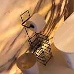 Swan S Pro Smart Toilet installed in a luxury bathroom with marble walls and ambient lighting.